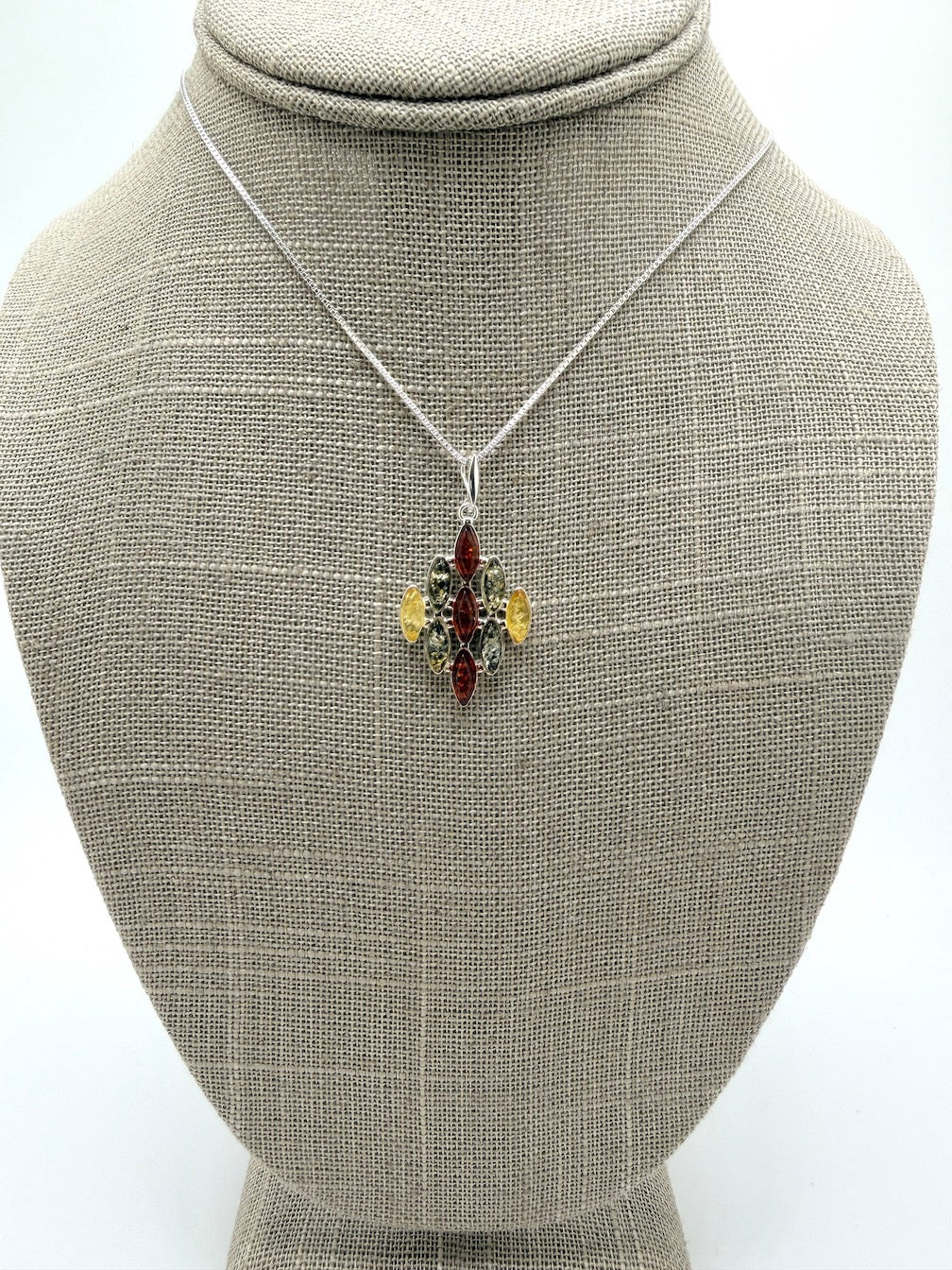 SEO Title:
Sterling Silver Multistone Baltic Amber Drop Pendant – Handmade in Poland – Marquise Amber Necklace