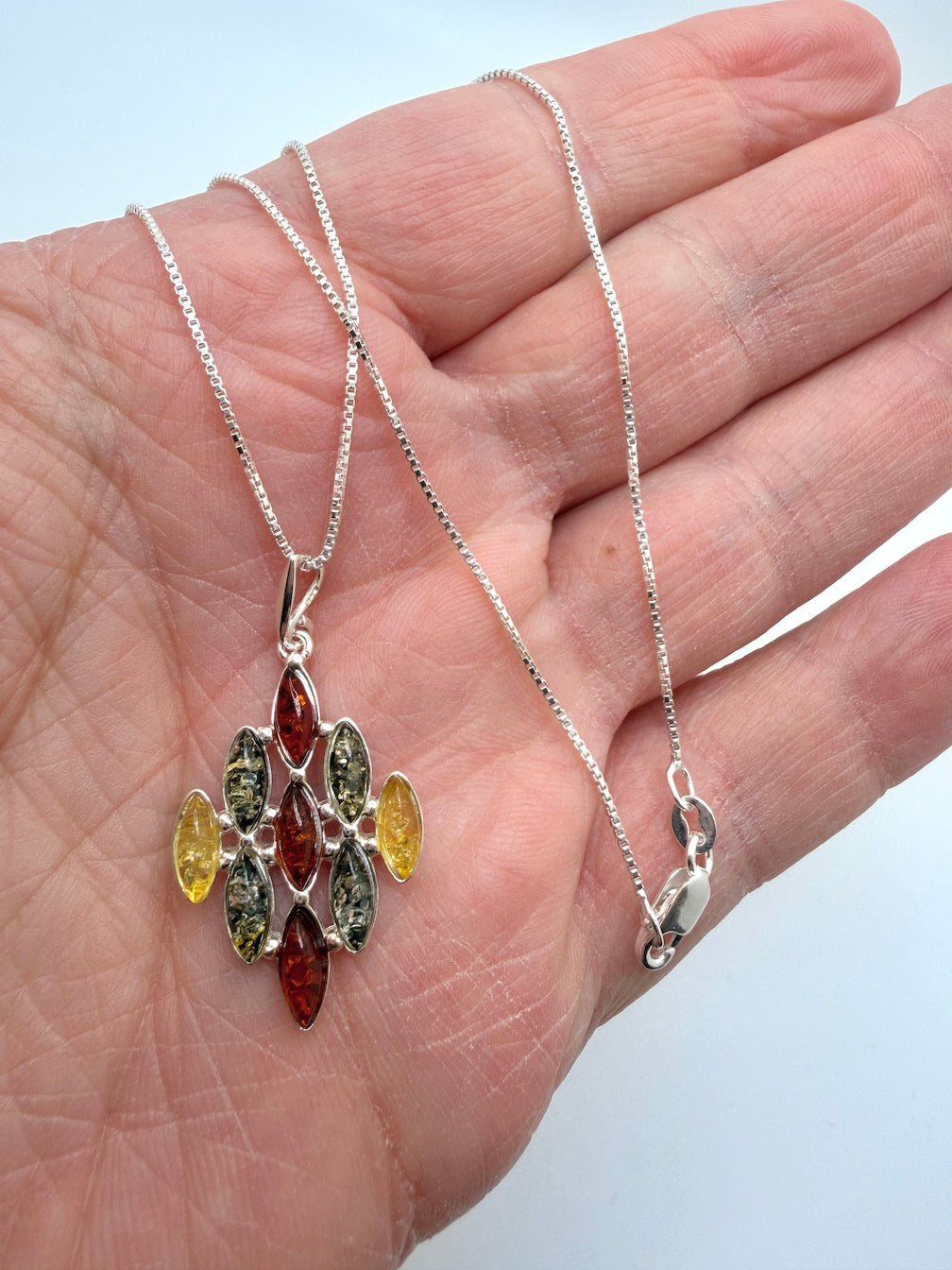 SEO Title:
Sterling Silver Multistone Baltic Amber Drop Pendant – Handmade in Poland – Marquise Amber Necklace