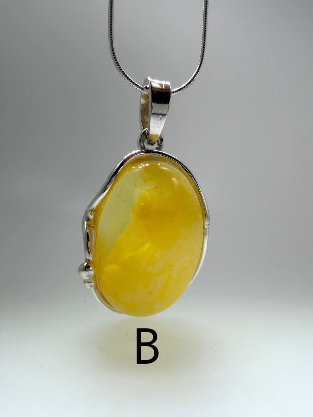 Sterling Silver Organic Pendant with Rare Butterscotch Baltic Amber – Modern Statement Necklace