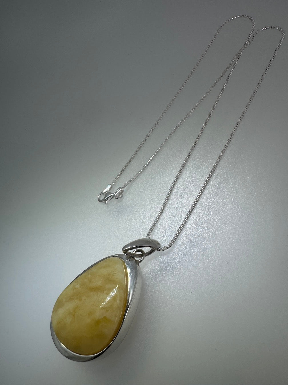 Sterling Silver Organic Pendant with Rare Butterscotch Baltic Amber – Modern Statement Necklace