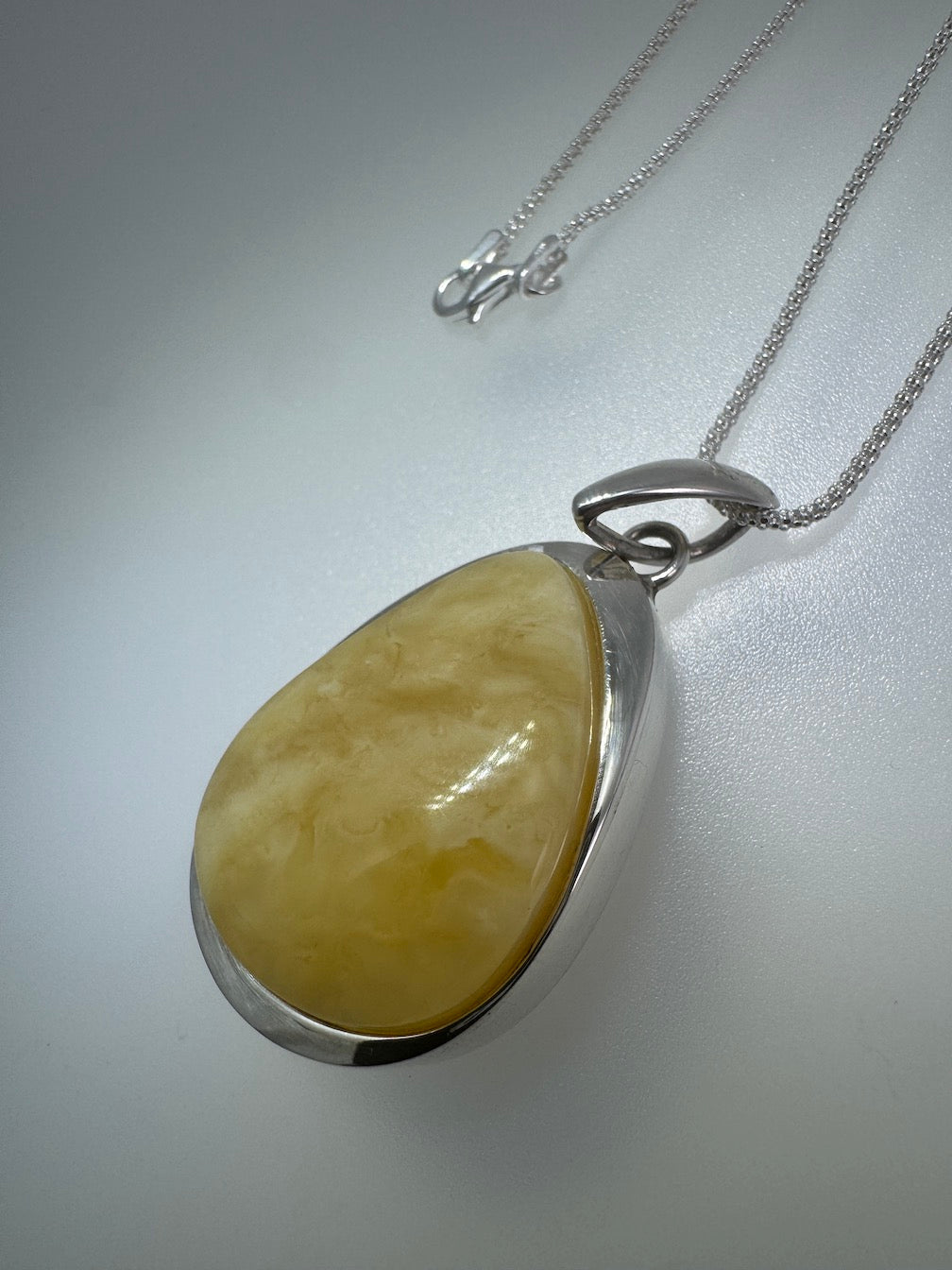 Sterling Silver Organic Pendant with Rare Butterscotch Baltic Amber – Modern Statement Necklace