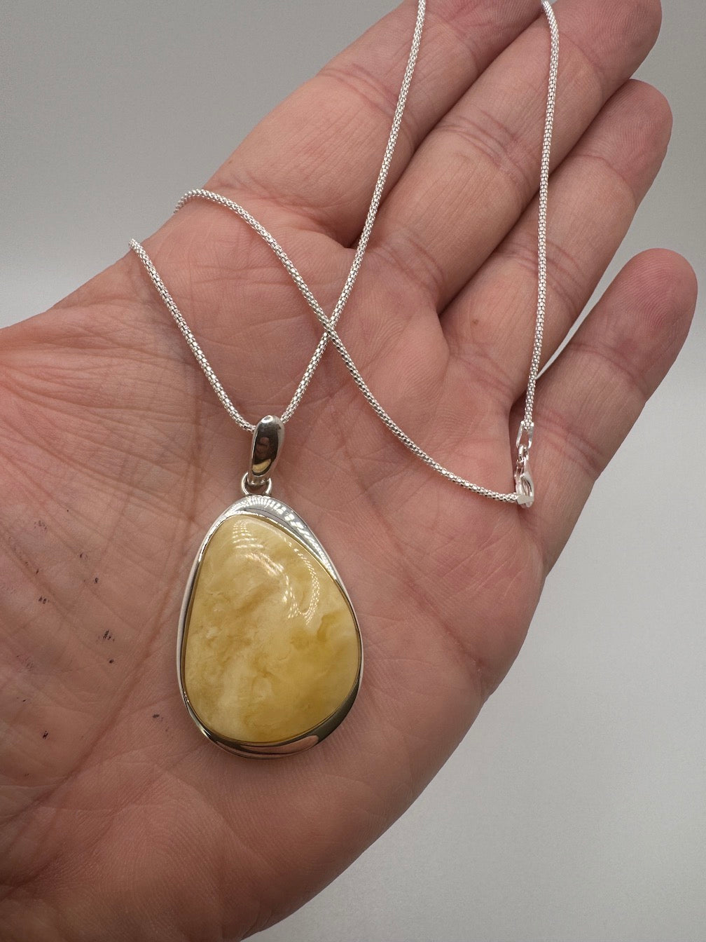 Sterling Silver Organic Pendant with Rare Butterscotch Baltic Amber – Modern Statement Necklace
