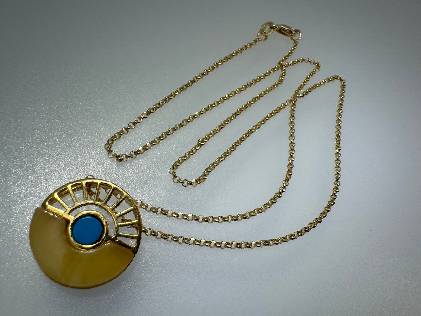 A Timeless Fusion of Cultures and Nature - Baltic amber and Turquoise Pendant on silver chain