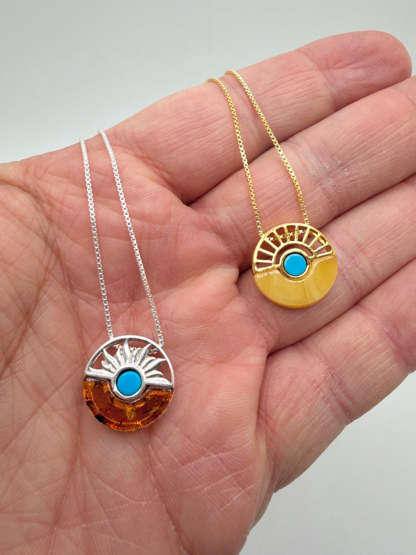 A Timeless Fusion of Cultures and Nature - Baltic amber and Turquoise Pendant on silver chain