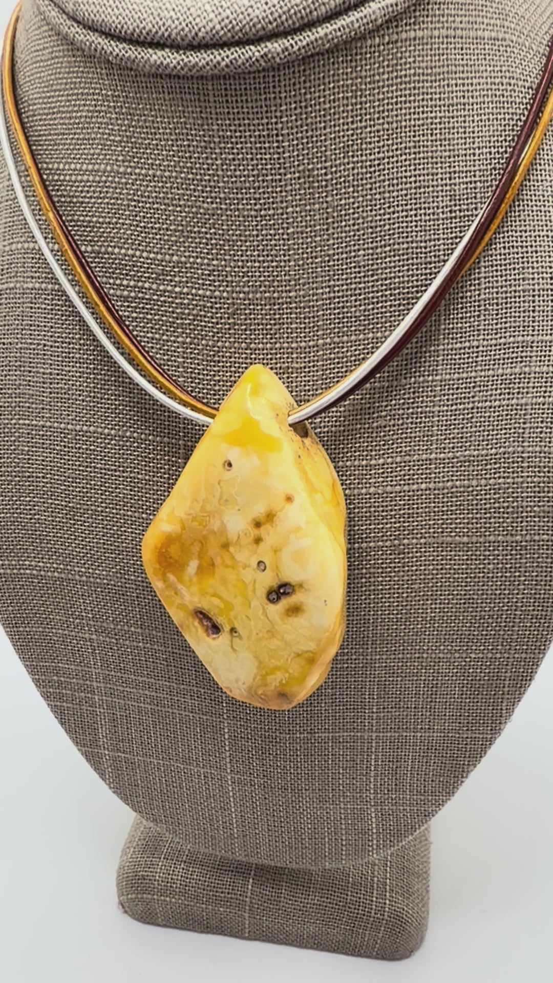 One of a kind Butterscotch Amber necklace on multi leather with silver clasp